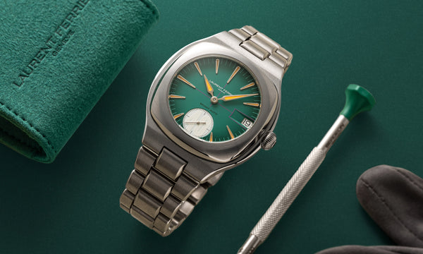 Série Atelier V "Sport Auto 40" by Swiss high watchmaker LAURENT FERRIER on a matching green background. 