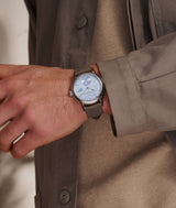 Wrishot of the Classic Auto Horizon worn by day on a man wrist.