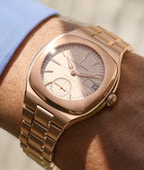 Wristshot with a ray of sunlight over the Sport Auto 79 full red gold and cream-coloured dial.