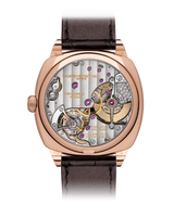Packshot picture of the back of the Square Micro-Rotor Silver back case with a view over the FBN229.01 natural escapement calibre