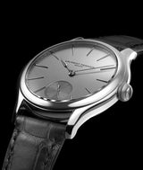 crown-side profile of laurent ferrier classic micro-rotor in white-gold with satin brush silver dial and black crocodile bracelet