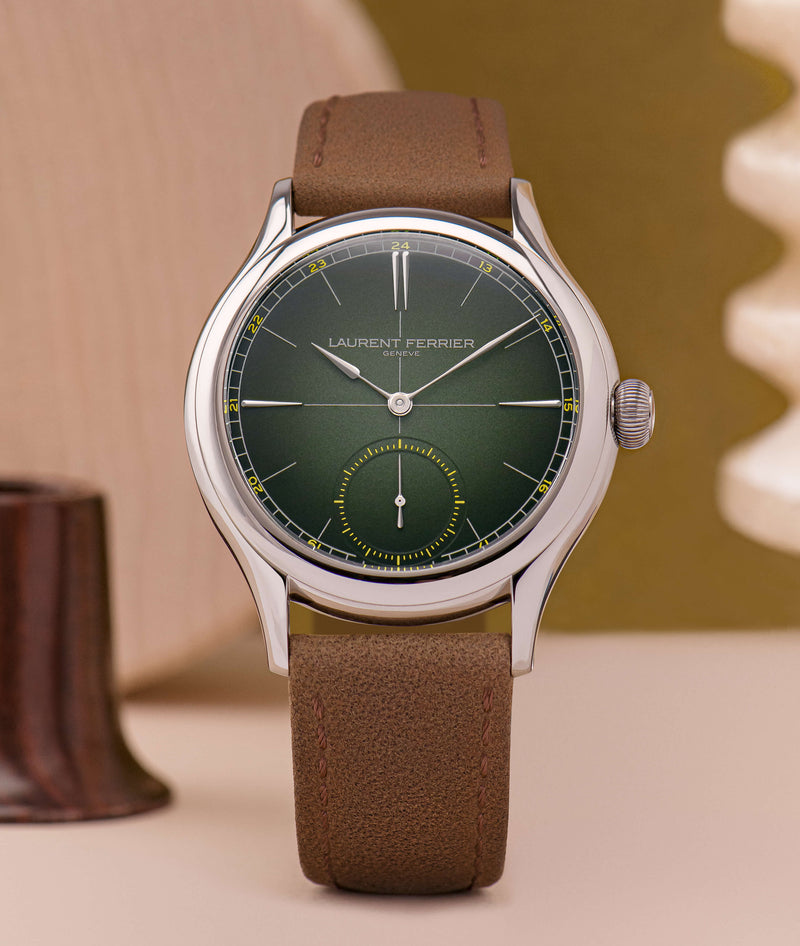 front "soldat" view of laurent ferrier's "série atelier 1" classic origin green with moss green opaline dial and yellow accents, white gold hands and indexes and brown leather bracelet. Shot by Cyril Biselx