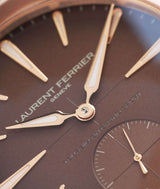 Macro shot of the gradient brown opaline dial with 5N red gold and white superluminova indexes and assegai hands on the Grand Sport Tourbillon Golden Brown image by Cyril Biselx