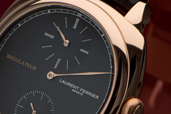 Laurent Ferrier Square Regulateur Watch Hand Closeup Red Gold Case Indexes And Hands On Red Gold Case and Black Opaline Dial. Photographer Cyril Biselx