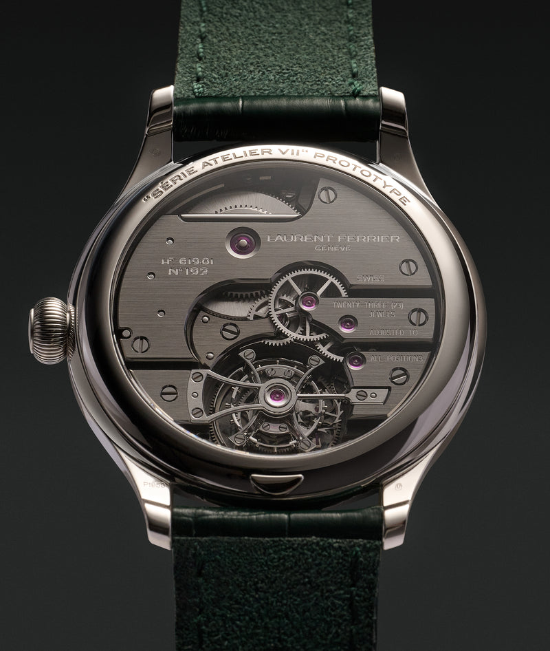 View over the case back of the Série Atelier VII classic tourbillon teal with for the very first time for LF, rhodium wheels and barrel