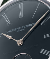 Laurent Ferrier Classic Tourbillon Double balance spring focus on the teal grand feu enamel dial and the assegai white gold hands