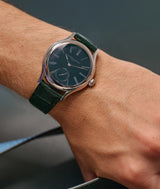 wrist shot of the Classic Tourbillon Teal Série Atelier VII with its platinum case