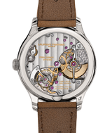 Packshot of the Classic Micro-Rotor Evergreen dial from the back with a view over the FBN229.01 calibre with a natural escapement.
