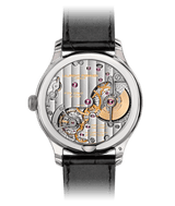 award-winning minimalist swiss fine watch movement on classic white gold case and black alligator bracelet