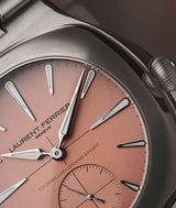 Macro view of the white gold assegai hands and indices adorned by white super luminova on the new 'Pursuit' rosy dial.
