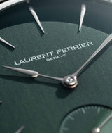 Close-up view of the "LAURENT FERRIER" logo on the latest 'Evergreen' Micro-Rotor watch with white gold indices and brand's infamous assegai spear hands.